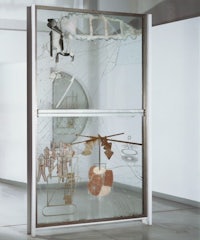 a glass door with various objects in it